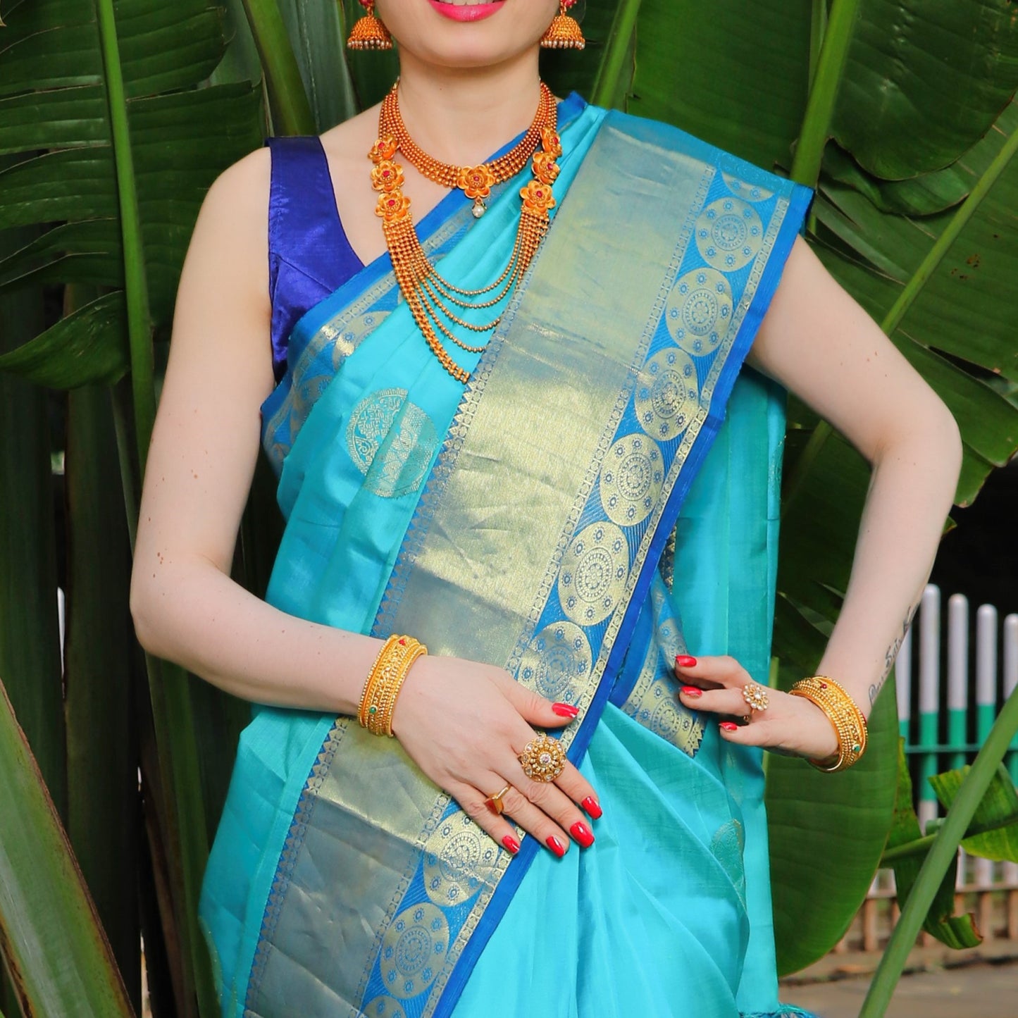 Maharani's Pure Handloom Kanjivaram Silk Saree - Turquoise with Blue Pallu and Golden Zari Border